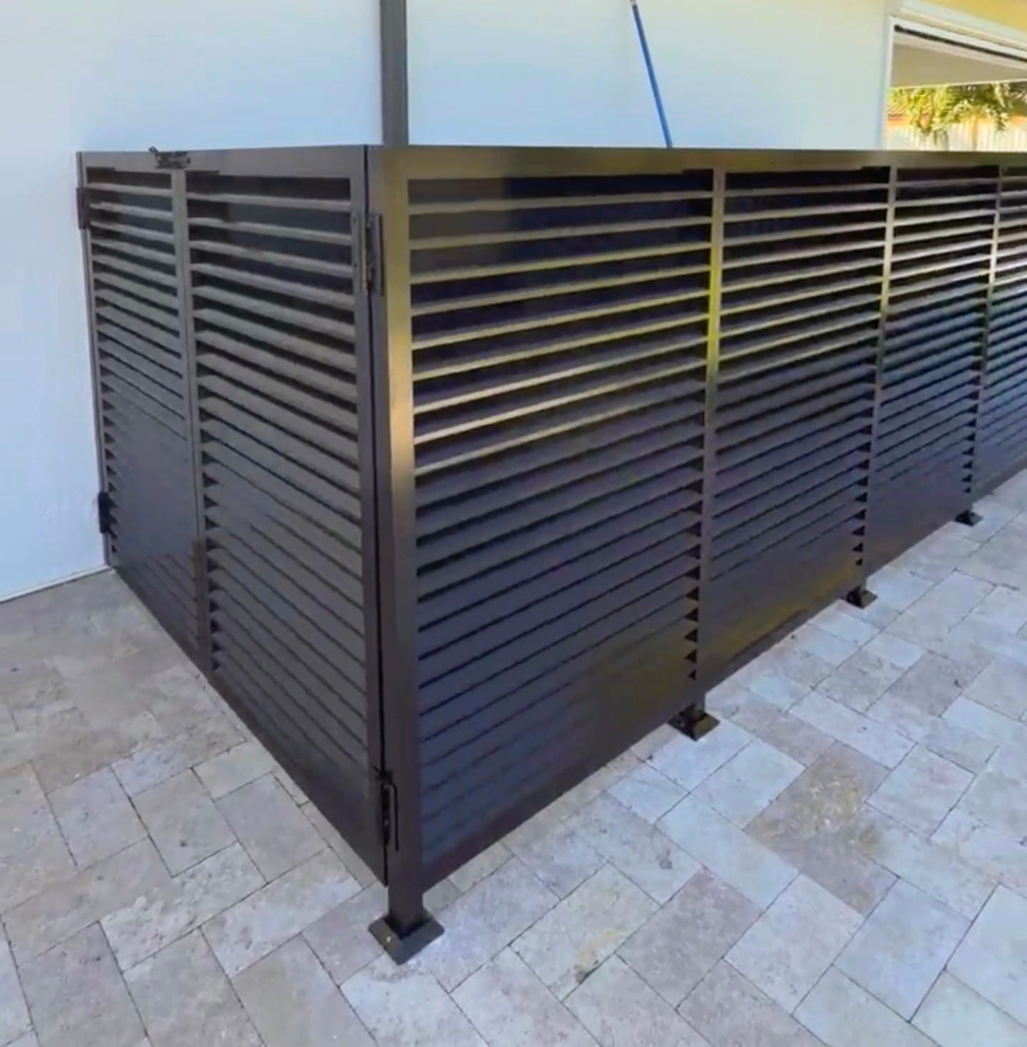White louvered aluminum privacy fence and gate