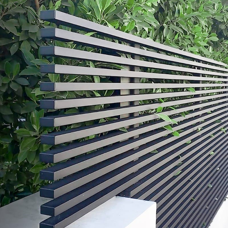 Modern horizontal aluminum slat fence with dark frame